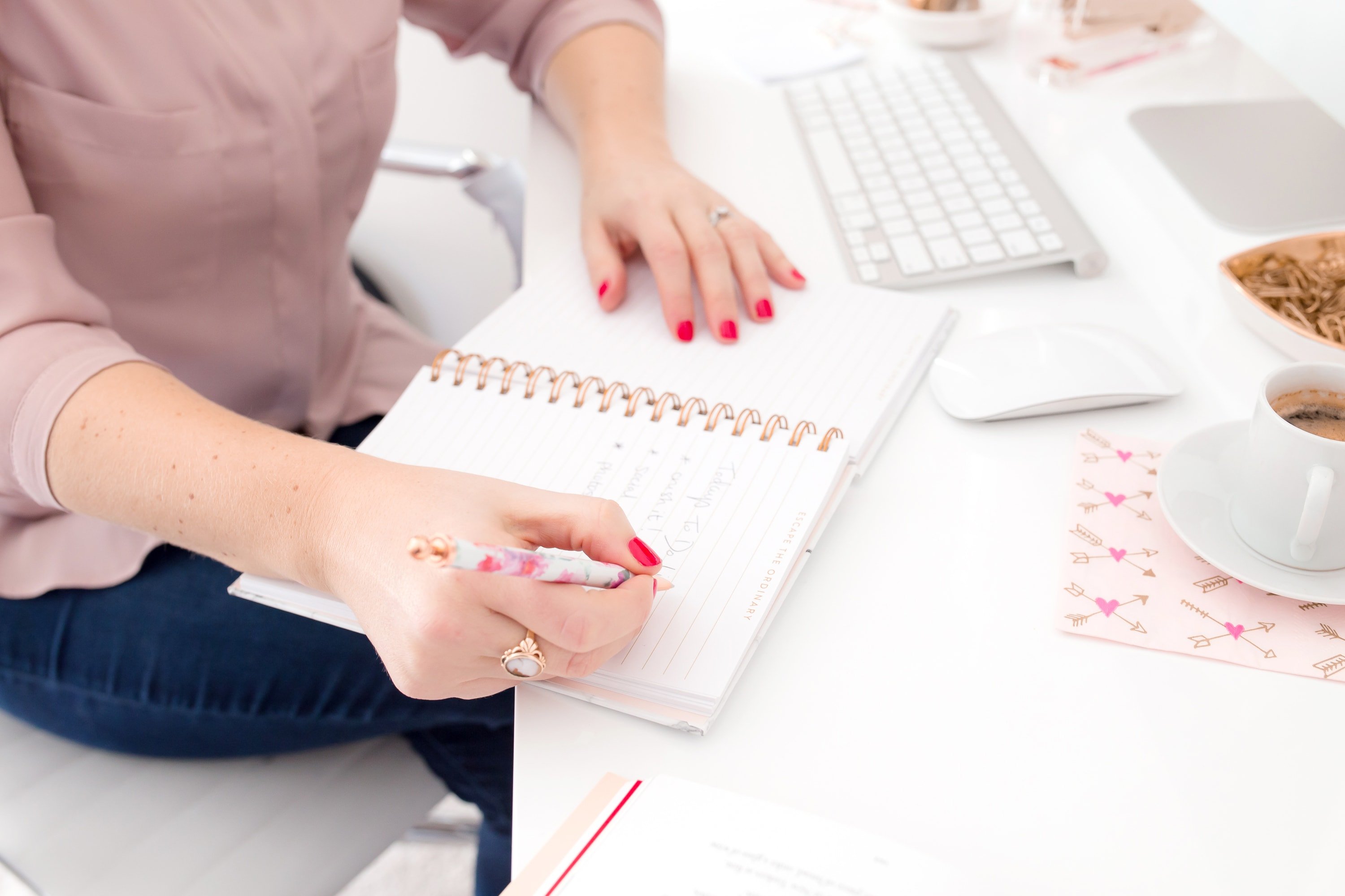 Woman writing a to do list